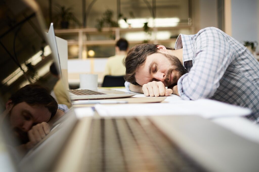 man sleeping needs energy supplements for executives